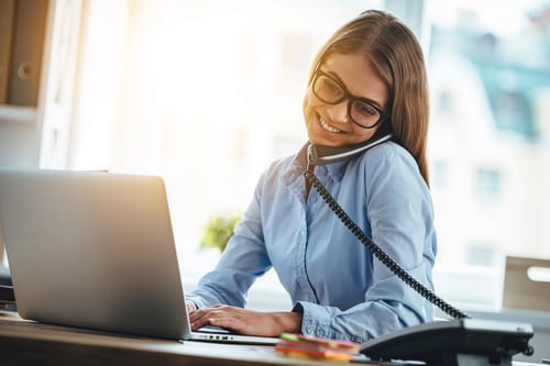 woman using cloud phone system
