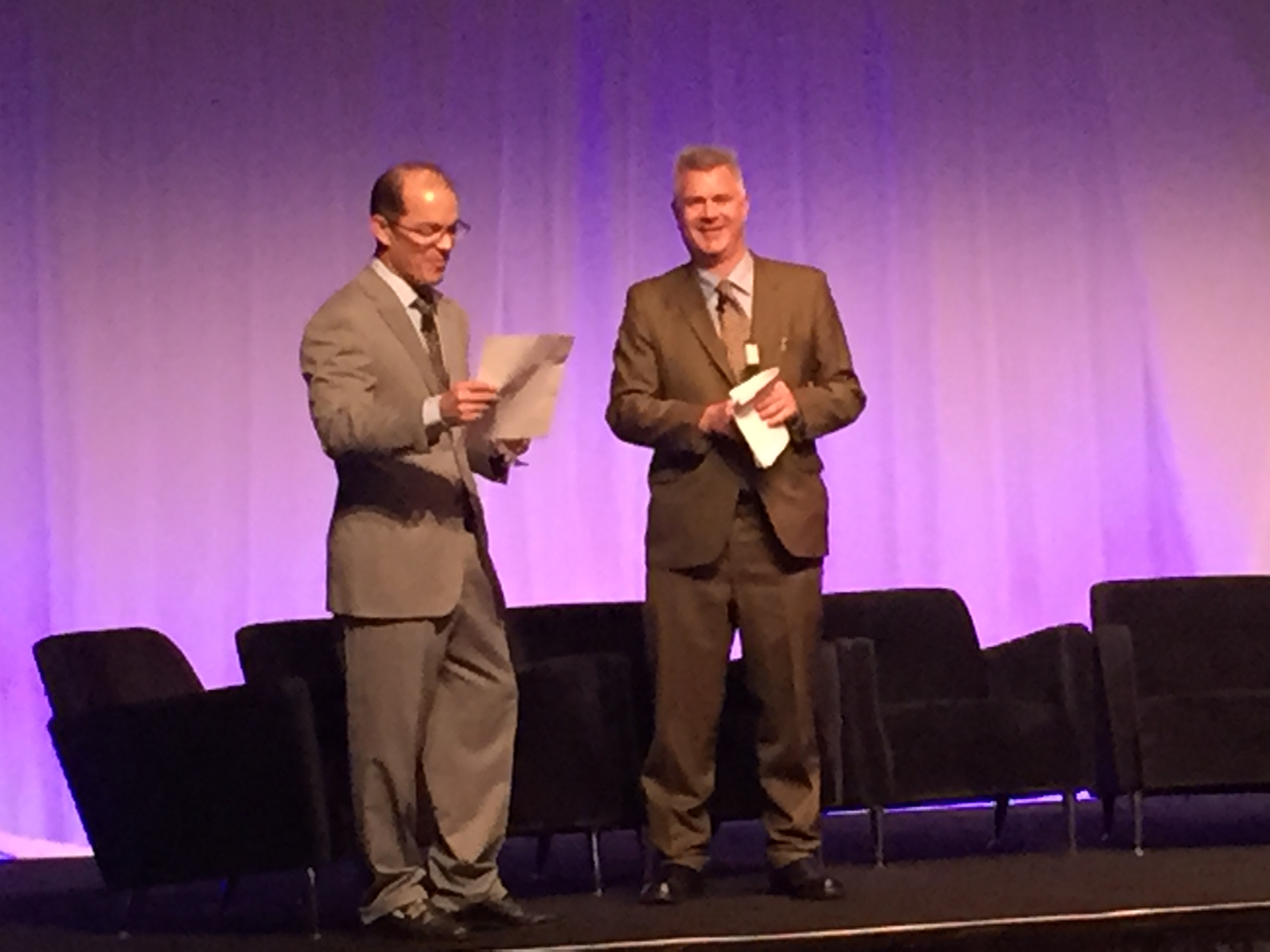 OnSIP's Tim Cleves' being introduced on a panel