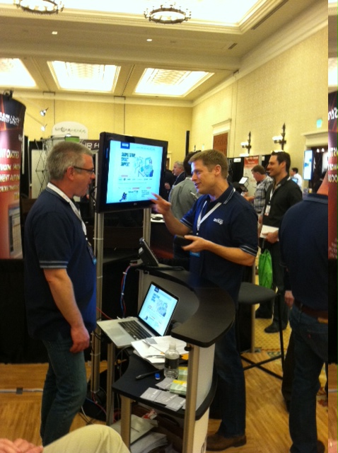 John and Tim next to the Polycom VVX 500 and the OnSIP display