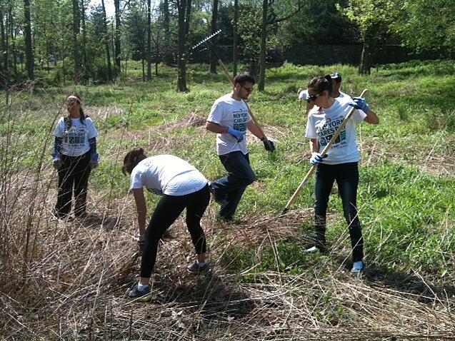 OnSIP team members doing yardwork