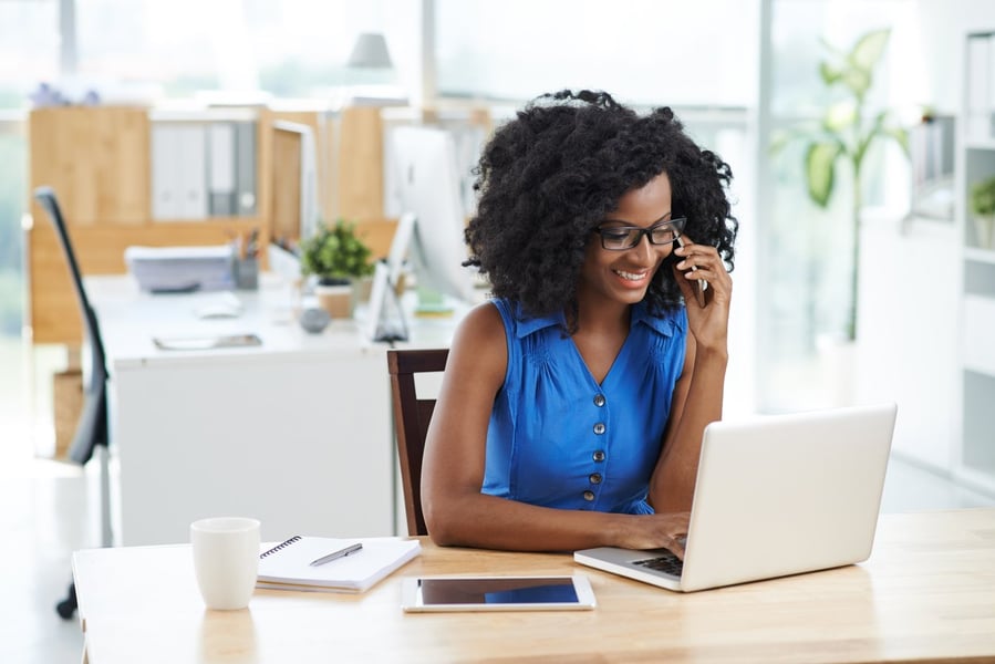 Real estate agent discussing newly available properties with her client.