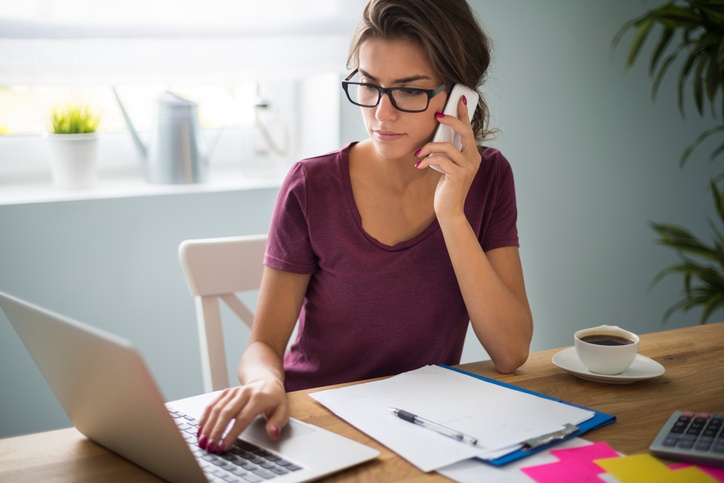 Woman reading service level agreement (SLA) for internet service