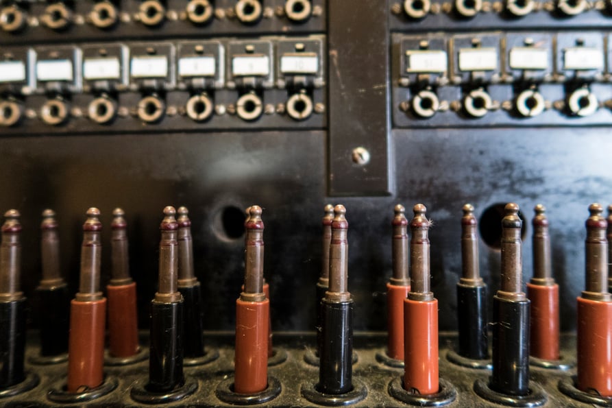 Old-fashioned phone switchboard, before auto attendants became the norm.