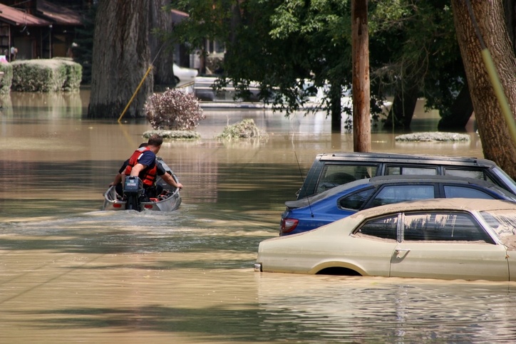 Search and rescue crews search for stranded residents