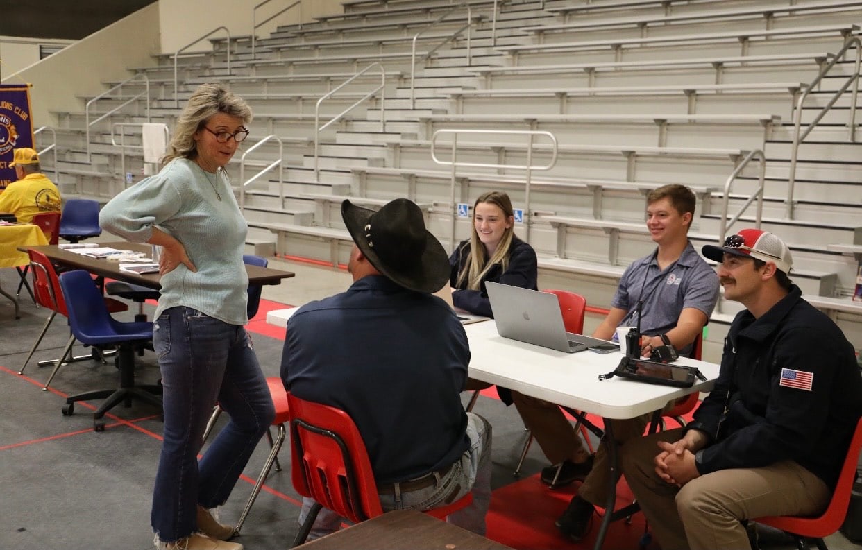 United Rescue Alliance volunteers sitting around a table