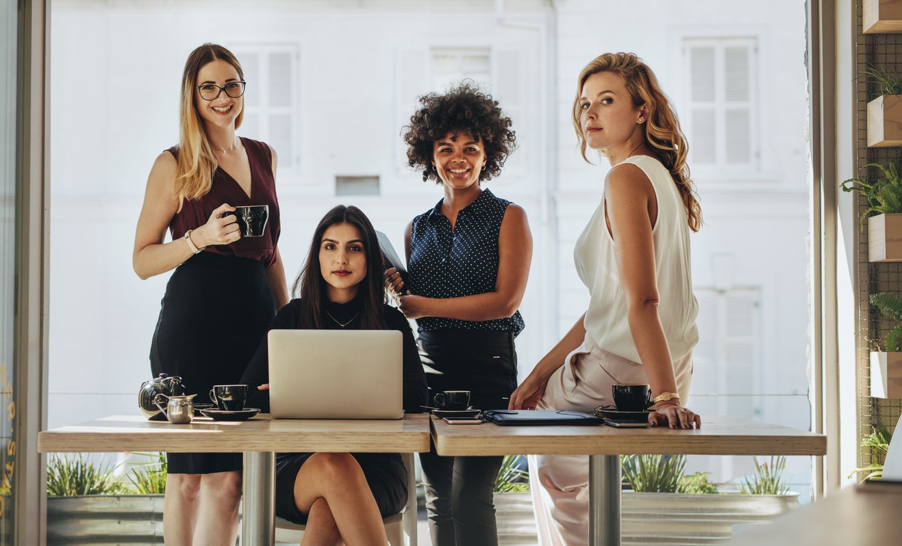 A group of female business leaders in their office.