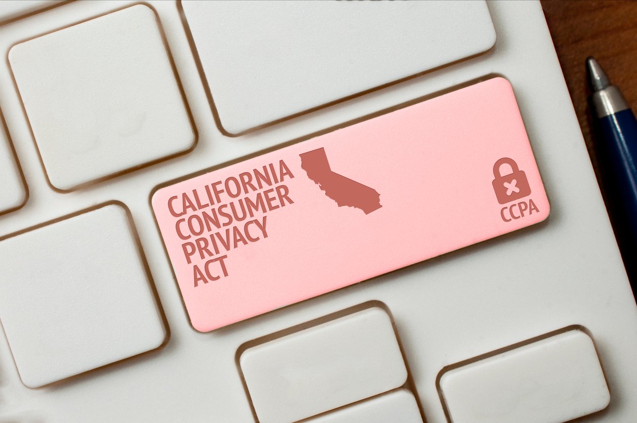 Photo showing the "Return" key on a keyboard in red with CCPA and the state of California.