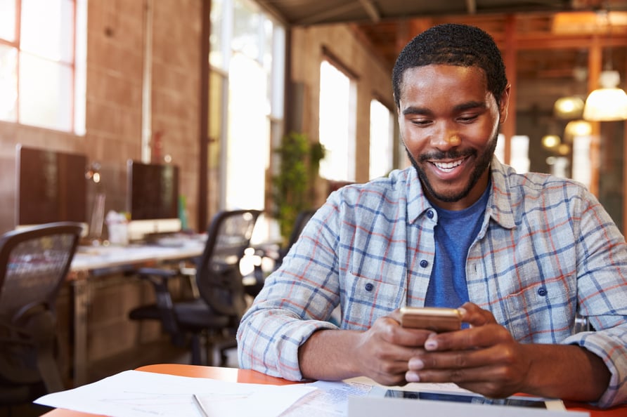 Man on mobile accessing business VoIP