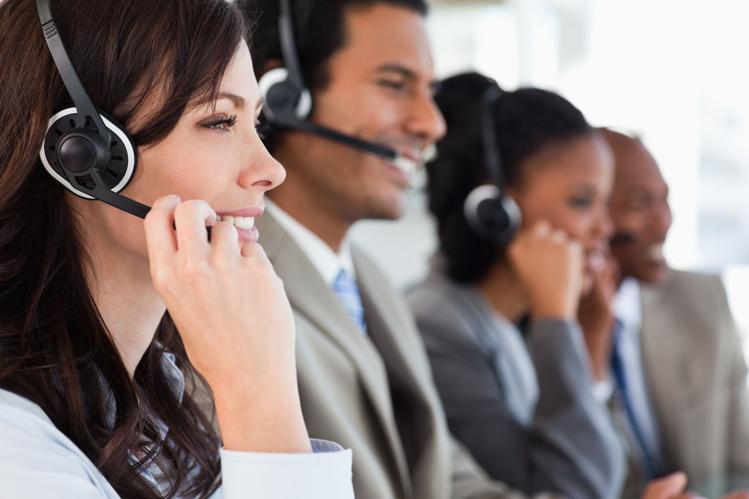 Employees taking calls in a contact center.