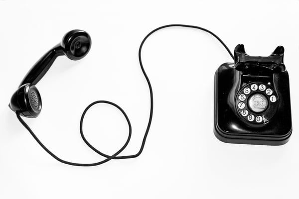 The humble telephone: handset, cord, and all.